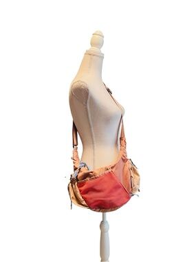 Baboon To The Moon Stylish Two-Tone Coral and Tan Crescent Crossbody Bag